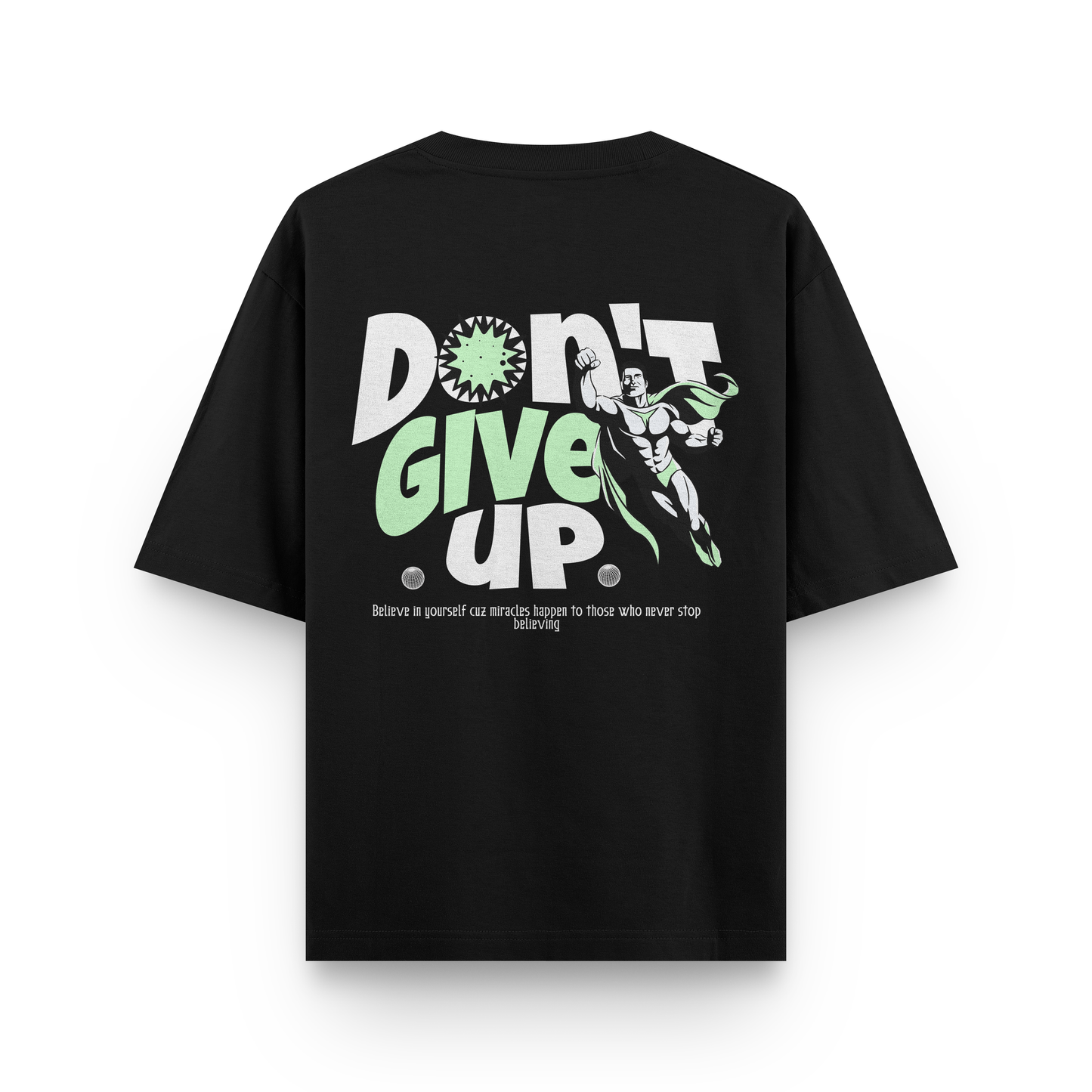 Black oversized t-shirt with green and white comic-style text “Don’t Give Up” and superhero illustration